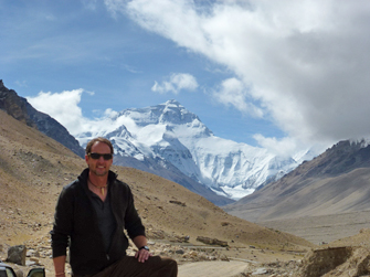 Dr. Cooper in front of Mt. Everest.